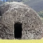 Red stone pukao located at Puna Pau, an archaeological site on Easter Island.