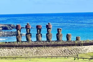 Moai statues with Pukao on Ahu Nau Nau in Rapa Nui.
